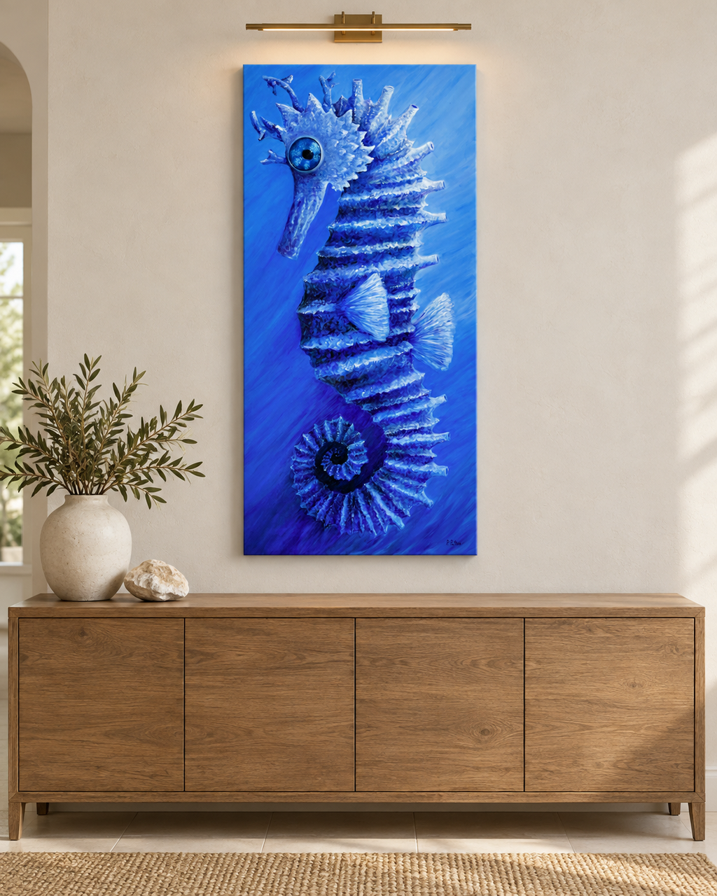 The Return displayed individually above wood console in contemporary coastal home